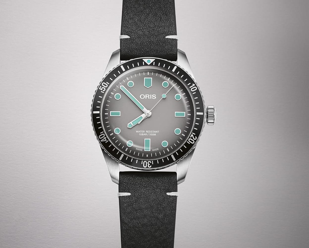 Oris Oris Divers Sixty‑Five 01 733 7707 4053-07 5 20 89, divers швейцария мужские часы на браслете кожаный боковой вид